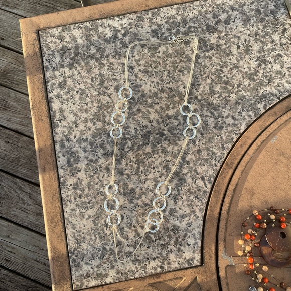 Silver circle hooked Necklace with people and pink circle earrings - Picture 3 of 7